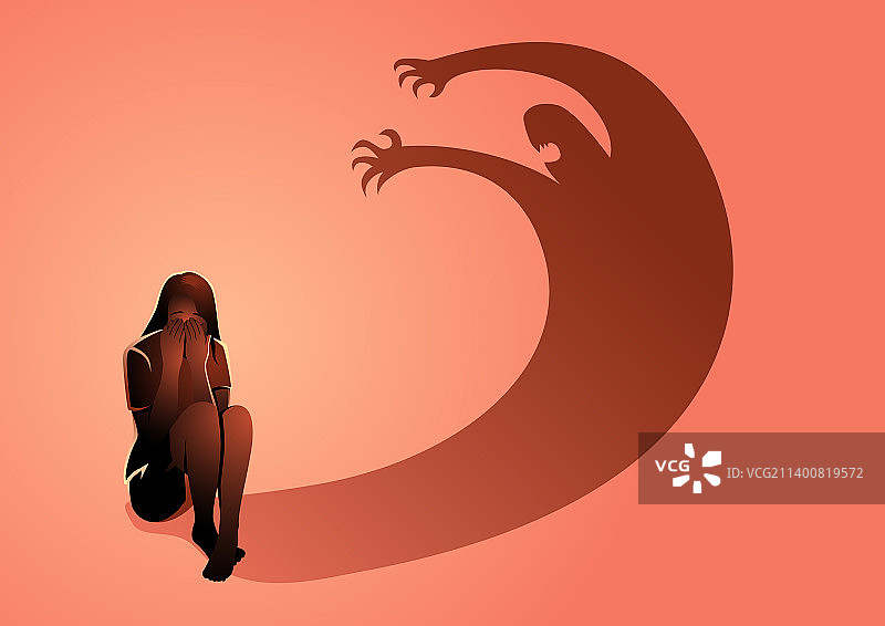 悲伤的女人坐在地板上图片素材