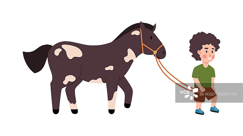 男童牵着马图片素材