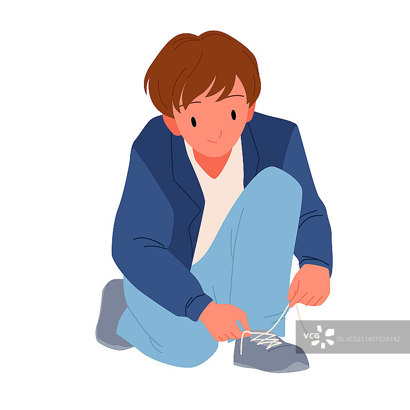 系鞋带的小男孩图片素材