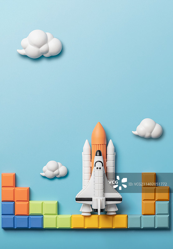 微缩创意糖果色方块上的载人航天飞机图片素材