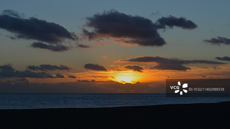 英国沃辛日落海景图片素材