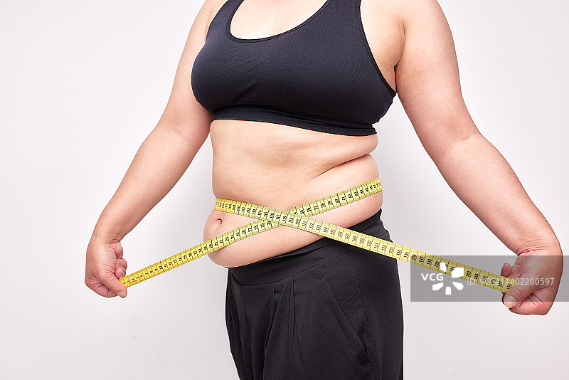 正在节食的超重日本女人图片素材