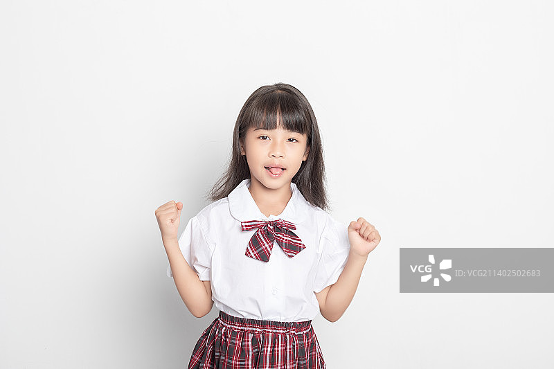 一个天真可爱的中国小学生图片素材