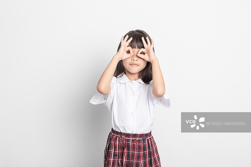 一个天真可爱的中国小学生图片素材