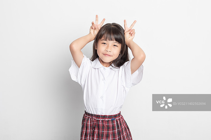 一个天真可爱的中国小学生图片素材