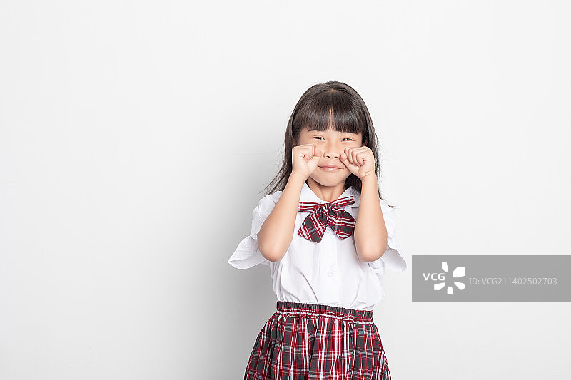 一个天真可爱的中国小学生图片素材