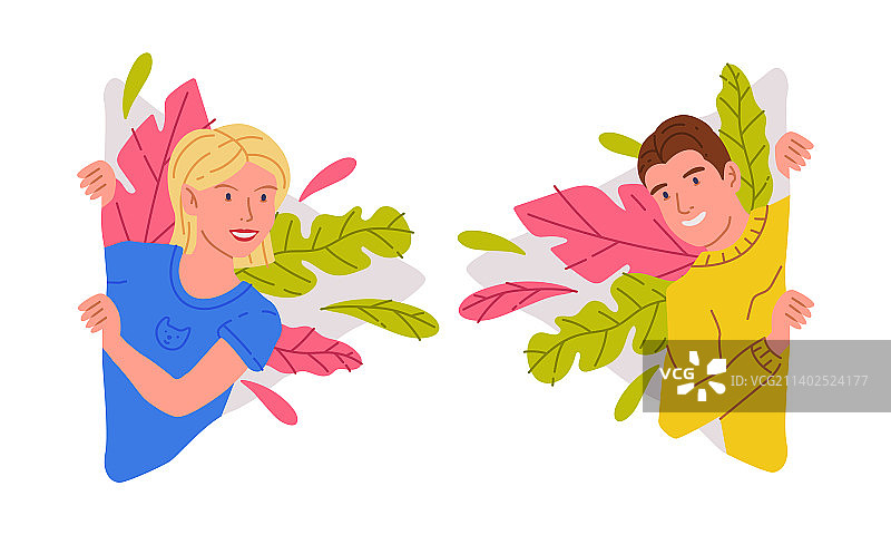 快乐的男人和女人在墙后偷看图片素材