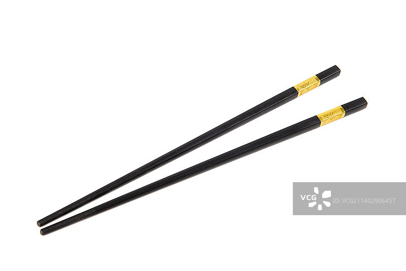 白色背景上的一双黑色合金筷子图片素材