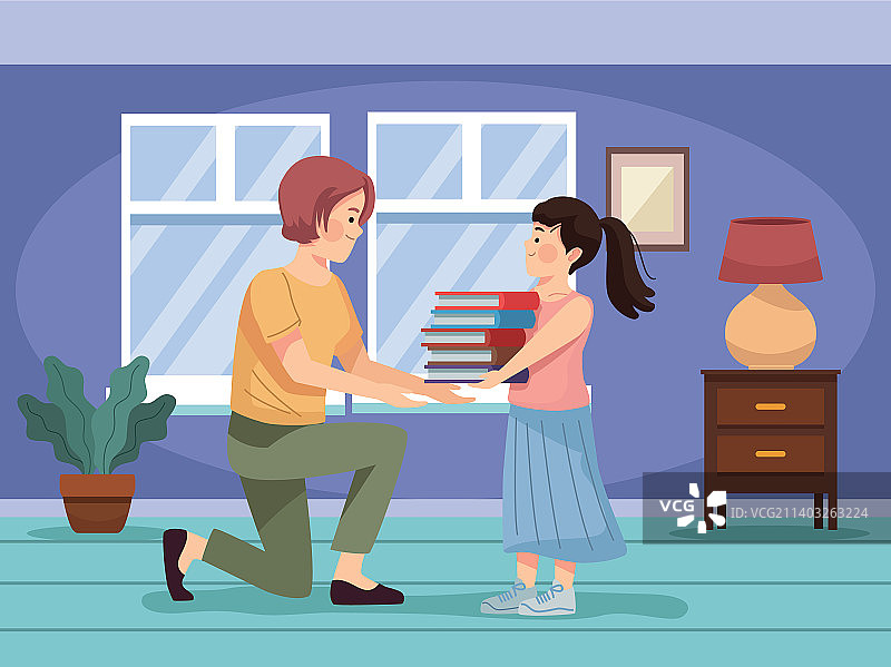 女儿和妈妈一起看书图片素材
