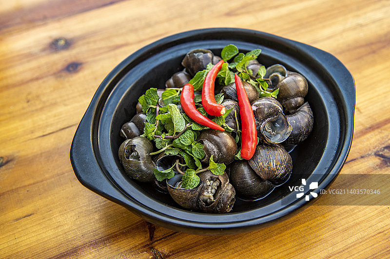湖南美食湘菜螺蛳肉图片素材