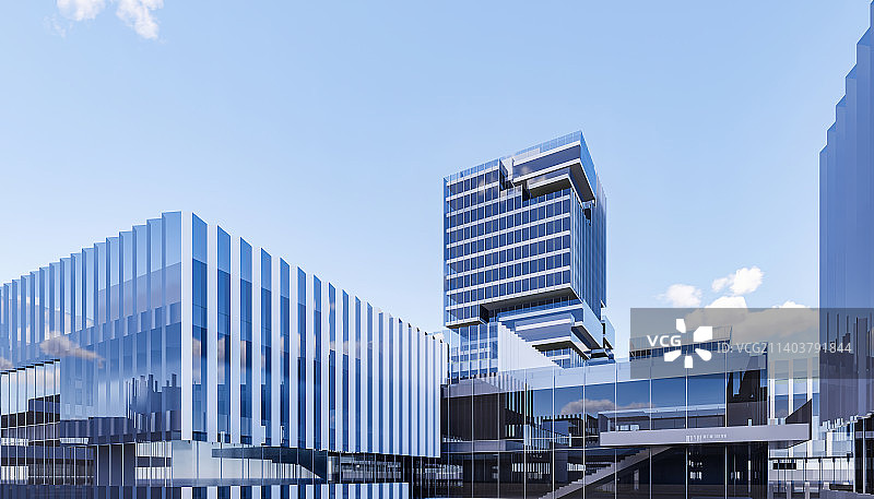 现代城市科技园办公园区商务区写字楼建筑外部玻璃幕墙特写图片素材