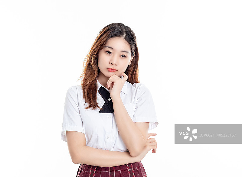 白底中一名漂亮的中国女大学生图片素材