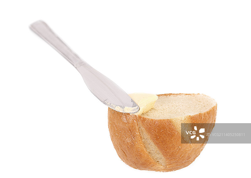 白色背景下的勺中糖特写图片素材