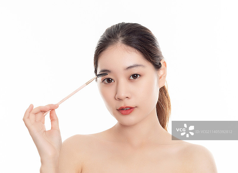 美容美妆概念一位年轻亚洲女性在化妆图片素材