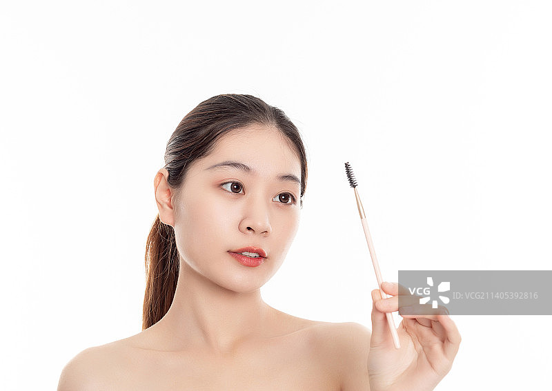 美容美妆概念一位年轻亚洲女性在化妆图片素材