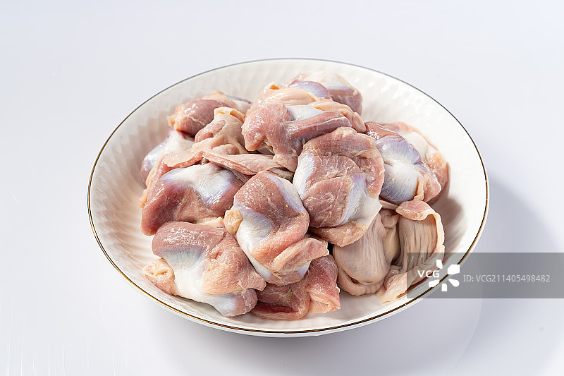 纯色背景下的新鲜鸡胗图片素材