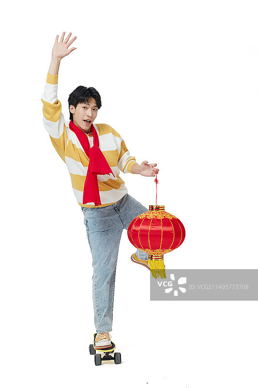 春节里红围巾年轻男生图片素材