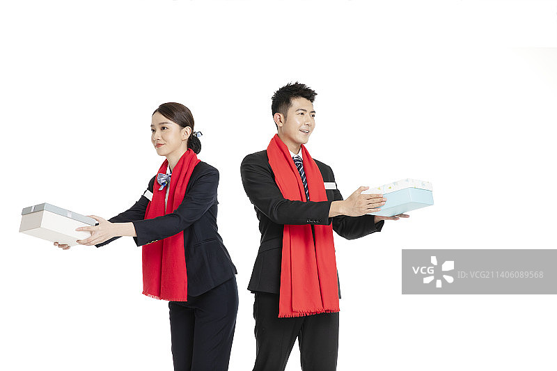 身着职业装的年轻男女拜年图片素材
