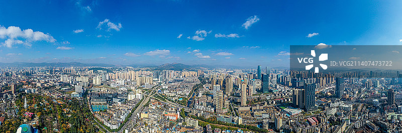 航拍云南昆明蓝天白云下的城市建筑群 五华区盘龙区边界图片素材
