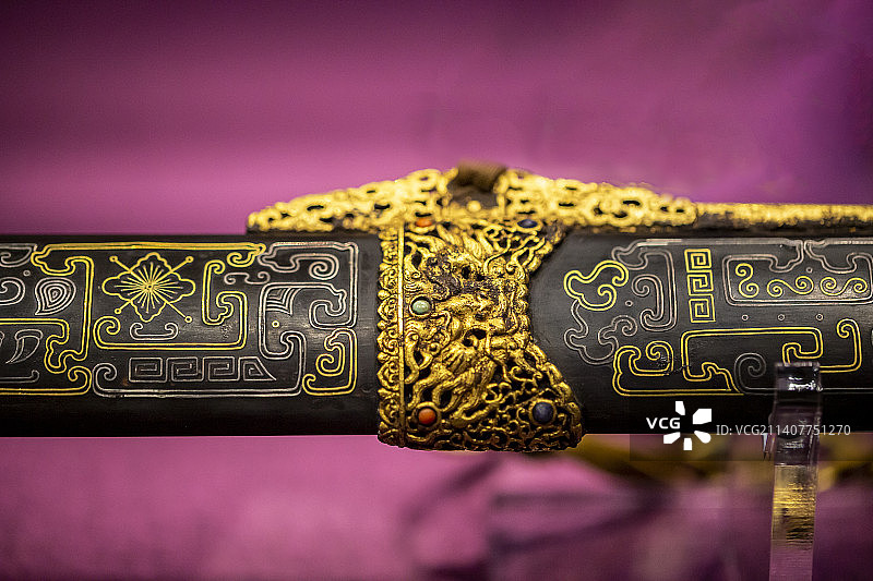 木柄黑漆鞘“太阿”腰刀刀柄（清乾隆十四年，乾隆帝命造办处打造此刀，本意在大阅时佩带使用。故宫藏）图片素材