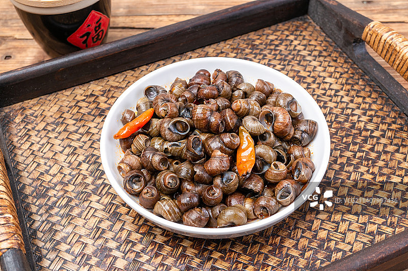 香辣爆炒田螺美食嗦螺图片素材