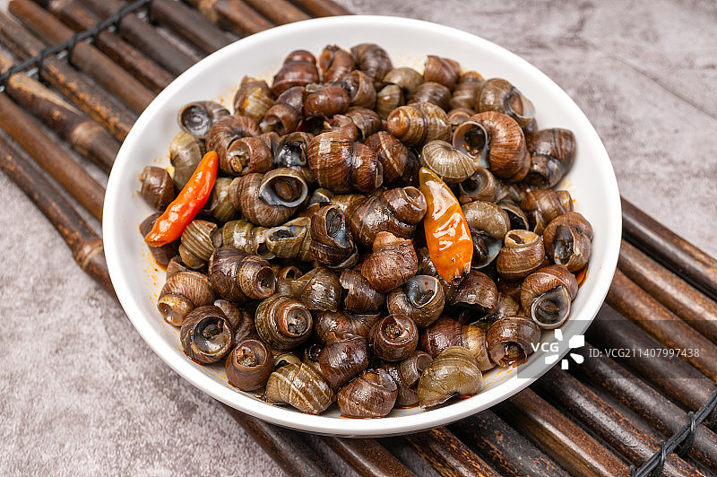 香辣爆炒田螺美食嗦螺图片素材