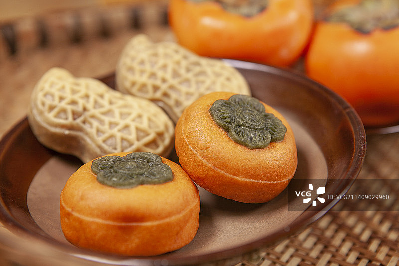 中华传统点心，国风风格，花生柿子糕点图片素材