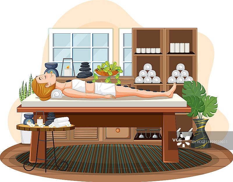 女人接受热石按摩图片素材