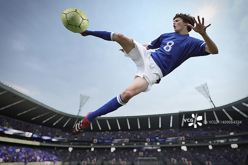 足球运动员击球图片素材