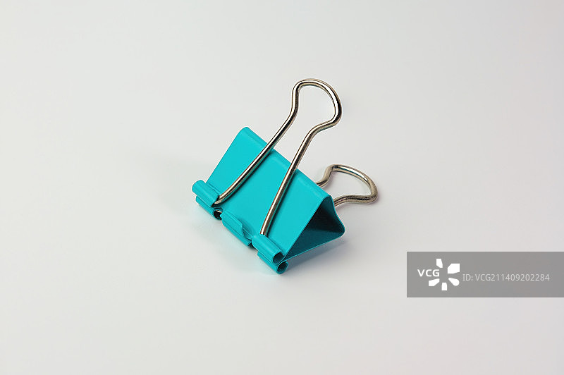 蓝绿色凤尾夹票夹白底图产品图图片素材