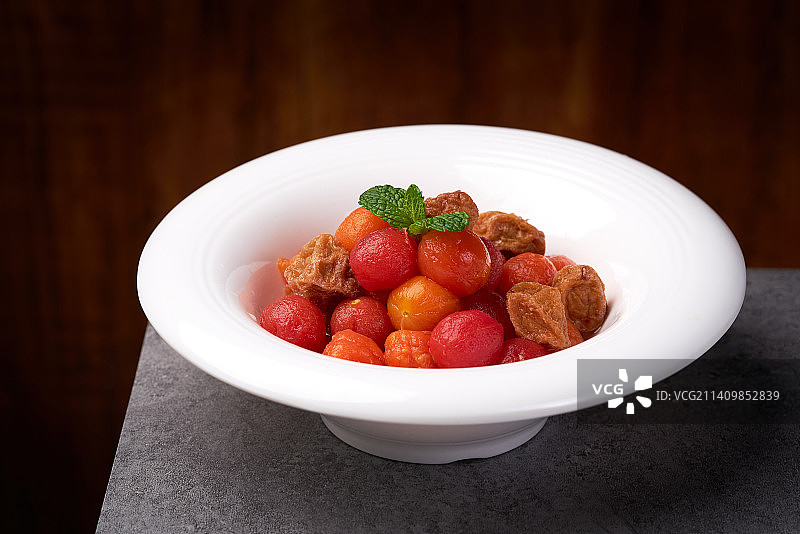 特色粤菜冰镇番茄话梅图片素材