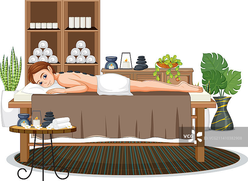 女人接受热石按摩图片素材