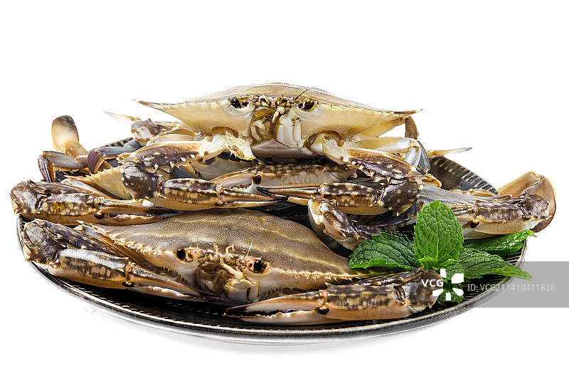 盘子里装着梭子蟹图片素材