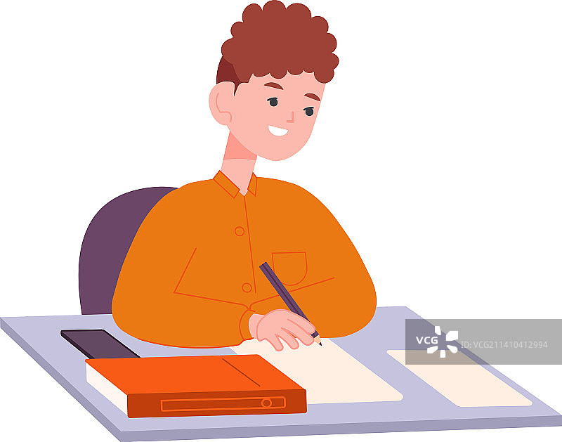 男孩在书桌前做作业图片素材