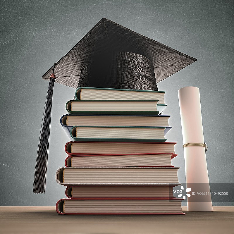 书堆上的毕业帽，艺术作品图片素材