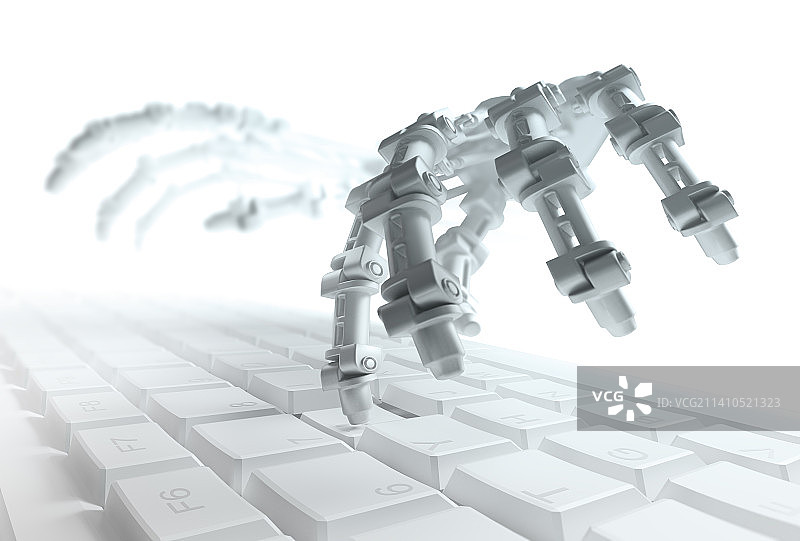 机器人手臂在电脑键盘上打字图片素材