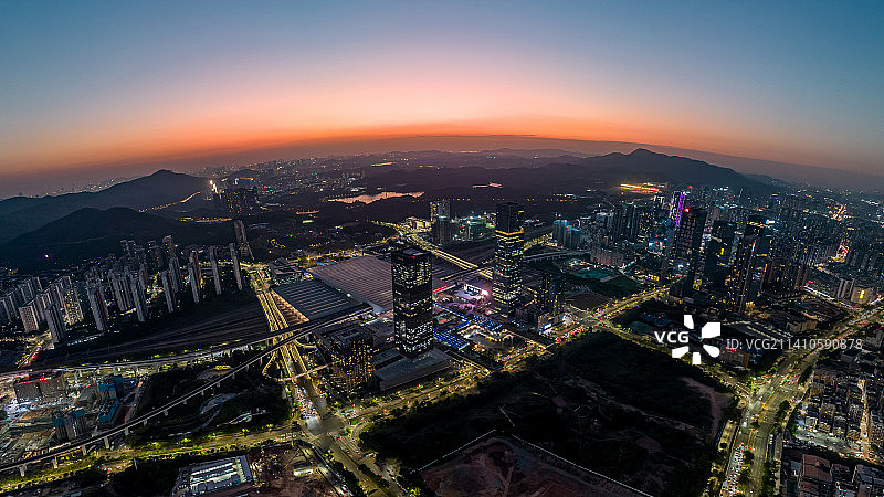 深圳龙华深圳北站夕阳夜景图片素材