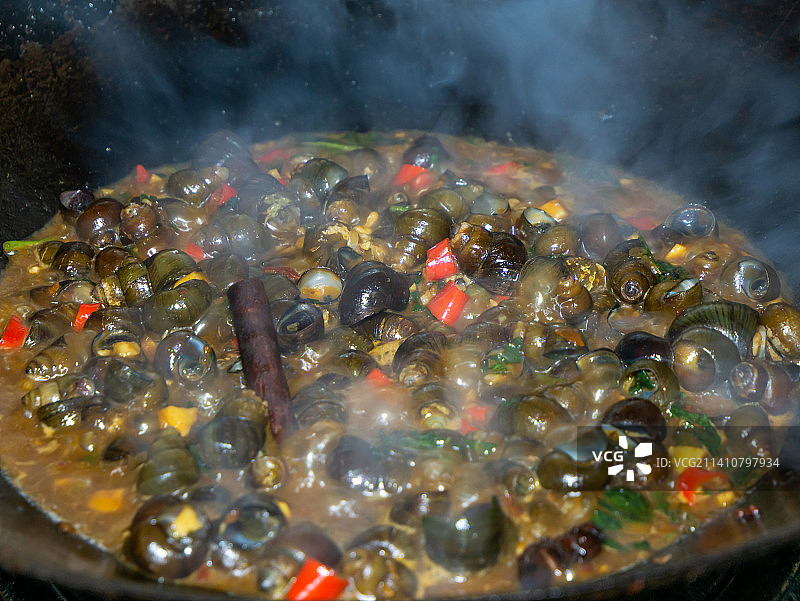 紫苏炒田螺美食小吃，美味嗦螺图片素材