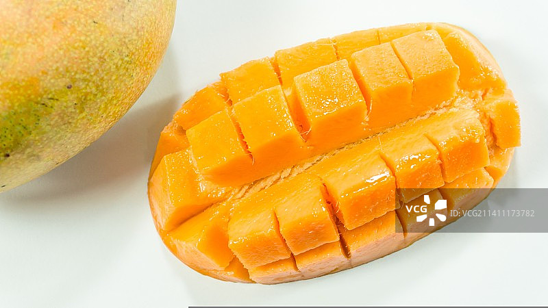 白色背景下的芒果特写，印度尼西亚图片素材