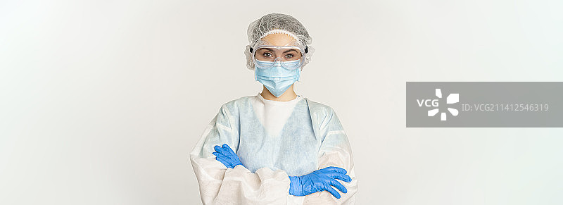 身穿个人防护装备的专业医生图片素材