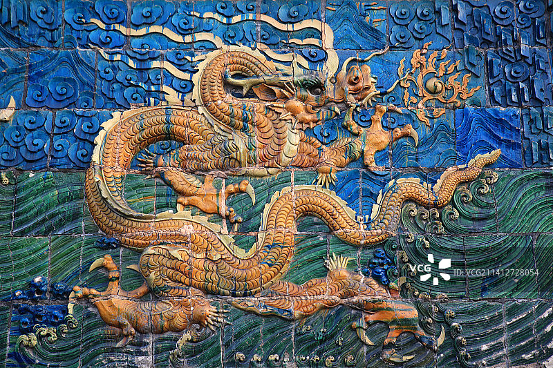 山西省大同市九龙壁（是明太祖朱元璋第十三子朱桂代王府邸前照壁）局部特写图片素材