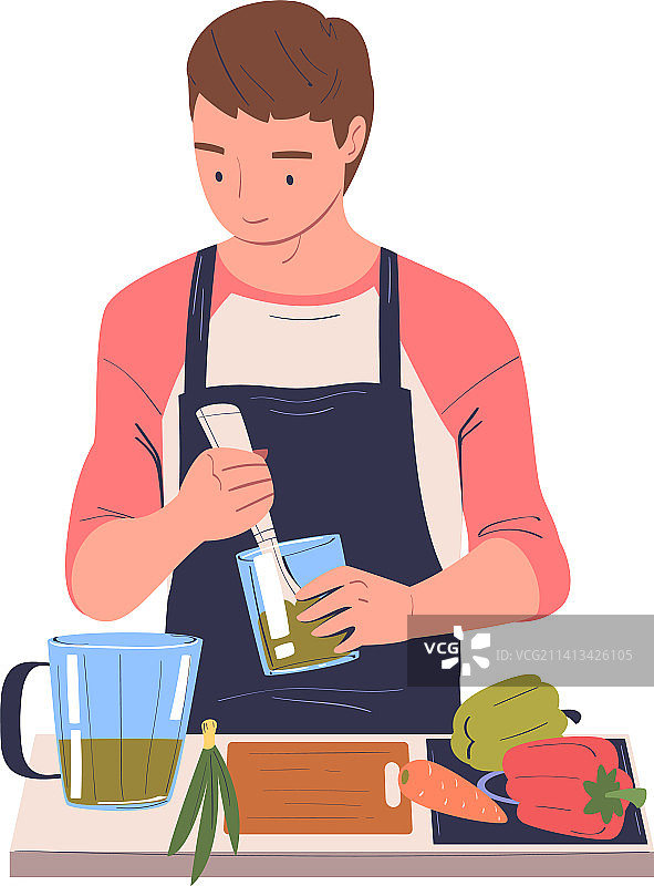 男人在家中餐桌旁做饭图片素材