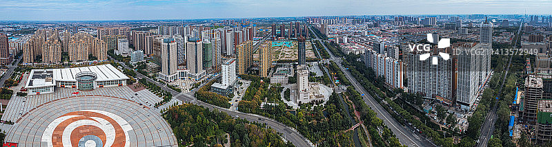 漯河市 地标 航拍 召陵区 淞江路 嵩山北路 漯河国际会展中心 新闻大厦 喜来登酒店 沙河图片素材