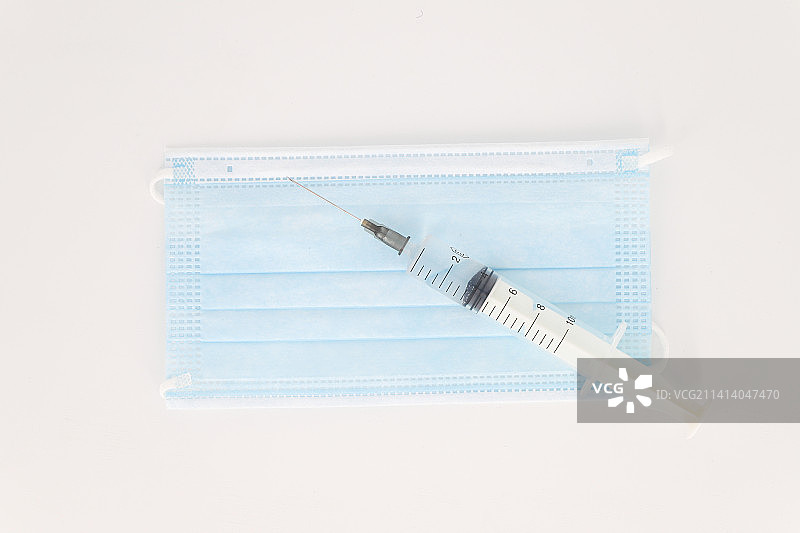疫苗注射器口罩医疗概念图片素材