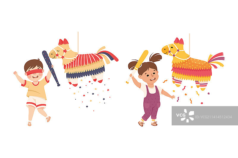 有趣的男孩和女孩敲打 pinata图片素材