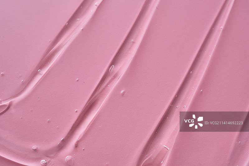 粉色背景上的化妆凝胶质地图片素材