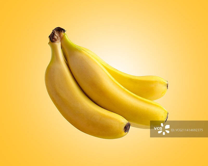 香蕉特写，背景黄色，西班牙巴塞罗那图片素材