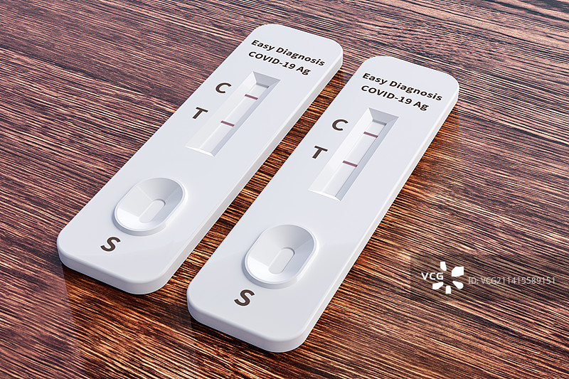 家庭自用的新冠病毒抗原检测盒阳性结果图片素材
