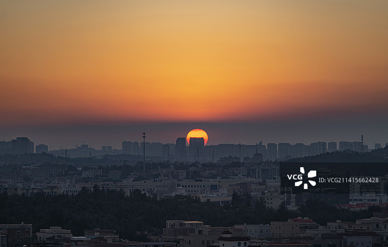 长焦拍摄泉州太阳落山图片素材