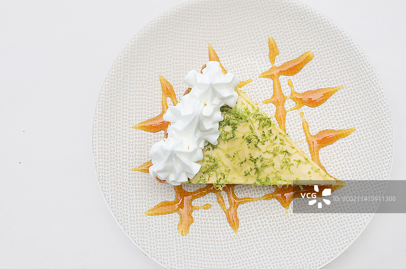 委内瑞拉卡拉沃沃州瓦伦西亚白色背景餐盘中食物俯视图图片素材